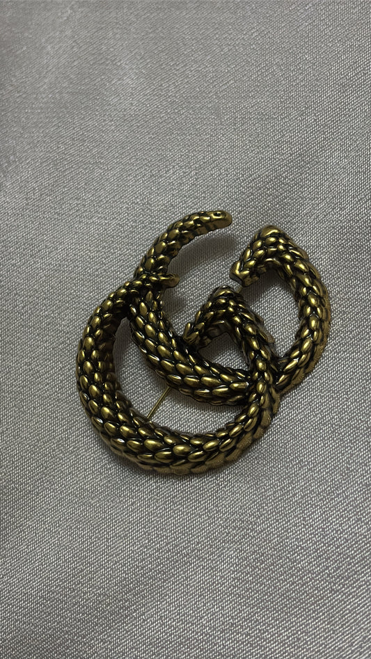 Bronze Gucci Broche